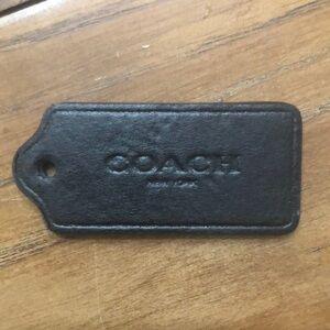 Coach black hang tag